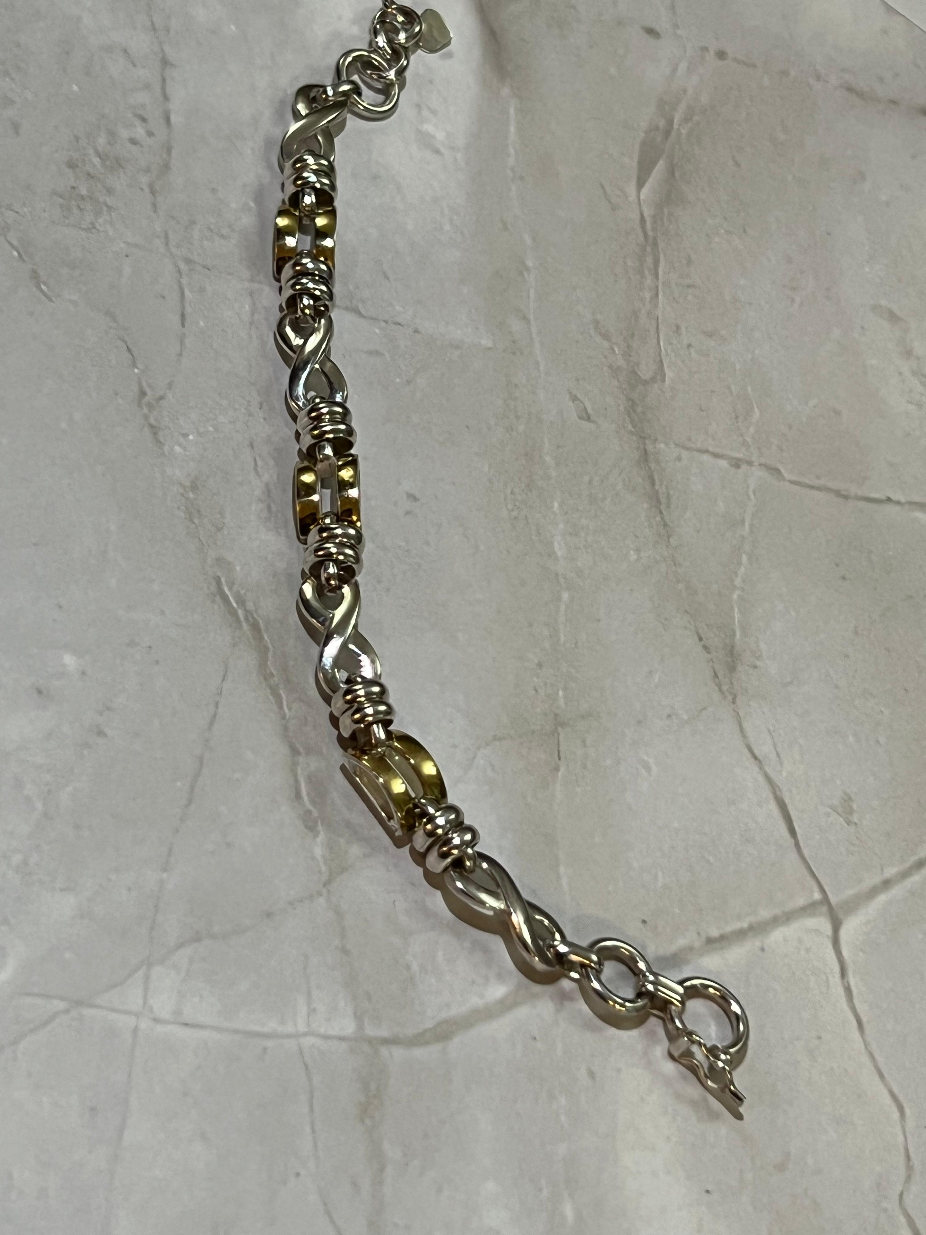 Twisted Infinity Link Design - 950 Silver Bracelet with 18K Gold Accents